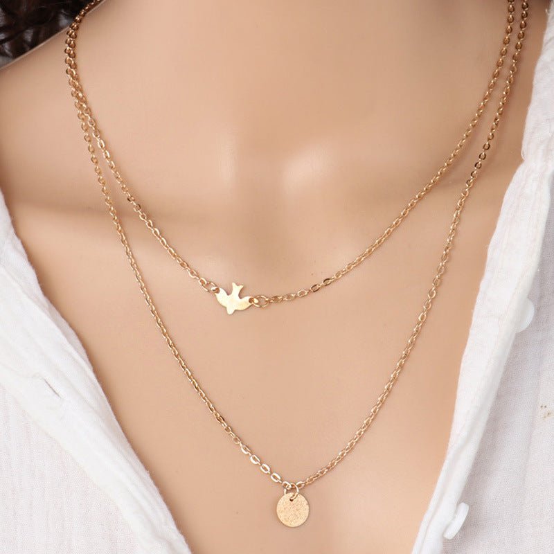 Bird and Disc Strand Necklace - THEONE APPAREL